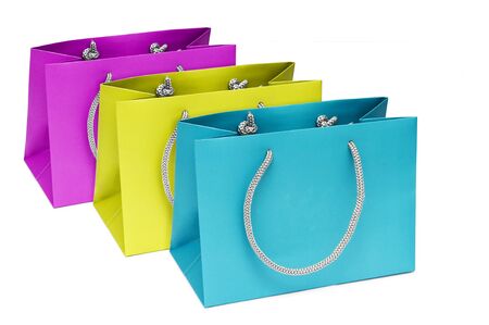 A shot of a bunch of colorful shopping bagsの写真素材