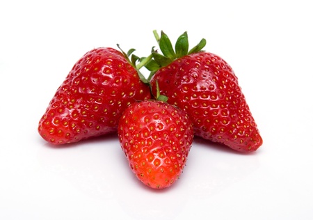 Three strawberries isolated on white backgroundの写真素材