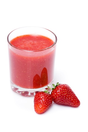 A glass of strawberry  smoothie isolated on whiteの写真素材