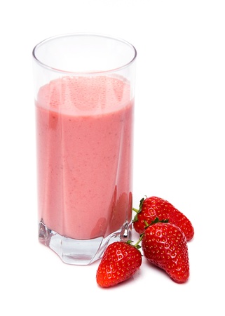 strawberry milkshake with three strawberries isolated on white backgroundの写真素材