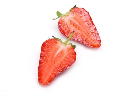 Two half of strawberry isolated on white background の写真素材