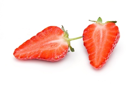 Two half of strawberry isolated on white background の写真素材