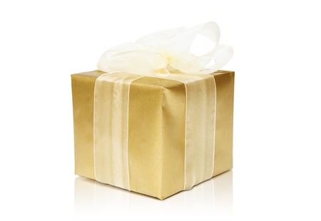 Golden gift box isolated on a white background with reflectionの写真素材