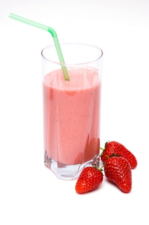 strawberry milkshake with three strawberries isolated on white backgroundの写真素材