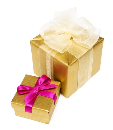 two golden gift boxes isolated on a white backgroundの写真素材