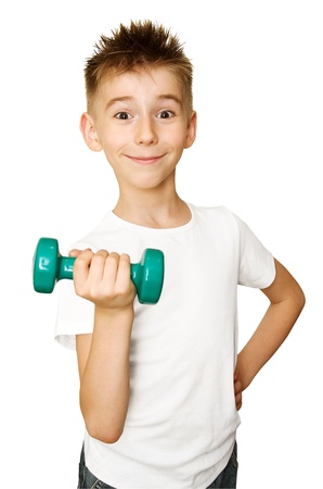 boy making exercises with a dumbbell on a white backgroundの写真素材