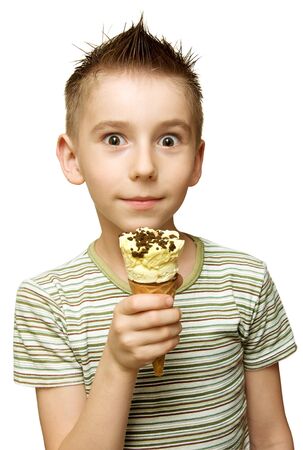 Surprised boy with ice cream in his hand isolated on whiteの写真素材