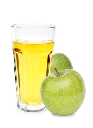 green apple with glass of apple juice over white backgroundの写真素材