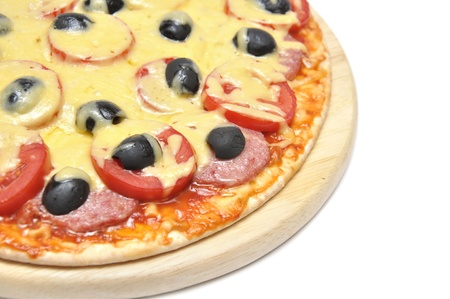 Pizza with tomatoes, sausage and olives isolated on white backgroundの写真素材