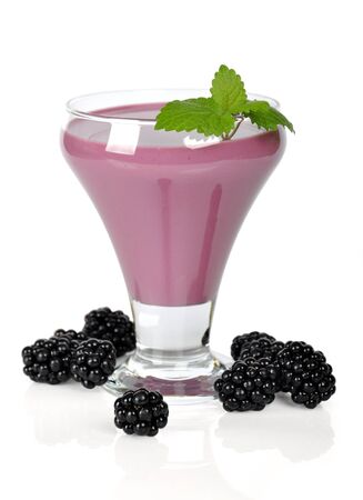 Berry smoothie with blackberry and mint over white backgroundの写真素材