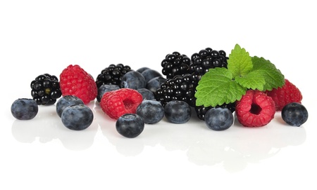 fresh blueberry, raspberry and blackberry isolated on white backgroundの写真素材