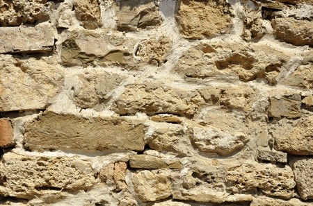 Background of stone wall textureの写真素材