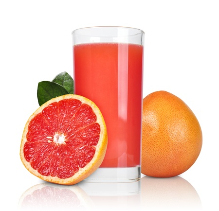 Glass of pink grapefruit juice isolated on whiteの写真素材