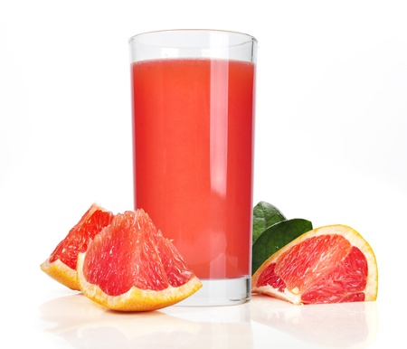 Glass of pink grapefruit juice isolated on whiteの写真素材