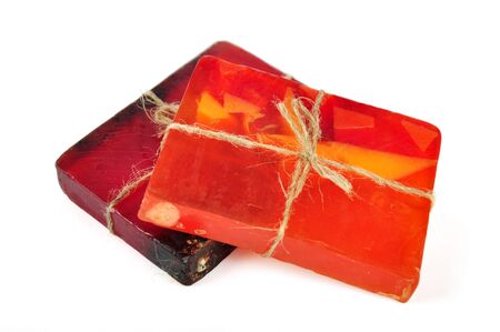 Rose and papaya Handmade Soap on a white backgroundの写真素材