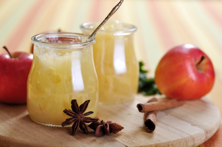 Apple jam with cinnamon on cutting board.の写真素材
