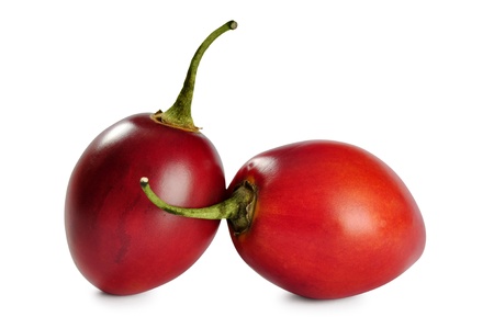 Two tamarillos isolated on white background の写真素材