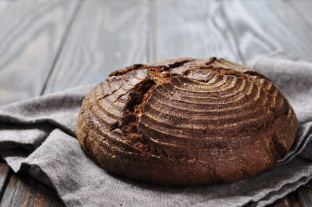 bread on a wooden background closeupの写真素材