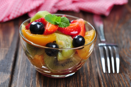 Fresh fruit salad with strawberry, kiwi and blueberryの写真素材