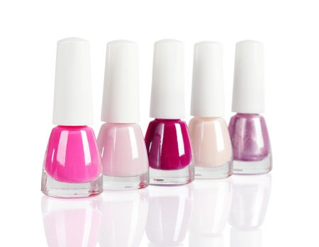 Group of bright nail polishes isolated on white. Clipping path included.の写真素材
