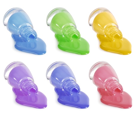 set of different colors nail polishes isolated on whiteの写真素材
