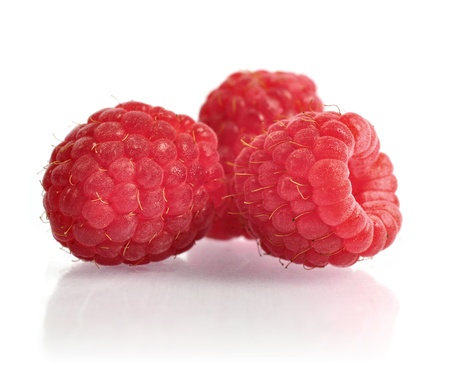 Ripe raspberries isolated on white backgroundの写真素材