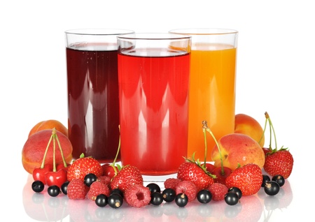 Berry juice in glasses with fresh berries isolated on white backgroundの写真素材