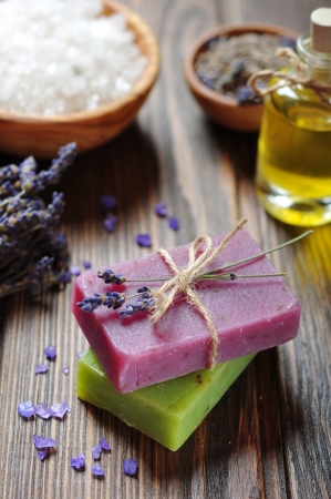 Herbal soap with oil, sea salt and lavander flowersの写真素材