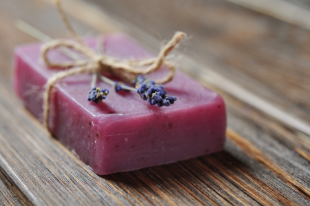 Lavander handmade soap with lavander flower over wooden backgroundの写真素材