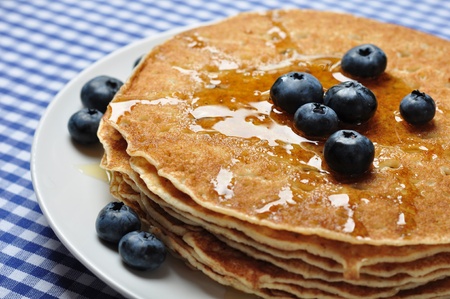Delicious pancakes close up, with fresh blueberries and maple syrupの写真素材