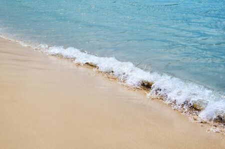 Soft wave of the sea on the sandy beachの写真素材