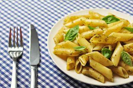 Pasta with Italian pesto sauce with basilの写真素材