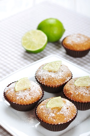 Diet muffins with bran  and fresh lime on plateの写真素材