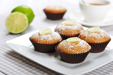 Diet muffins with bran  and fresh lime on plateの写真素材