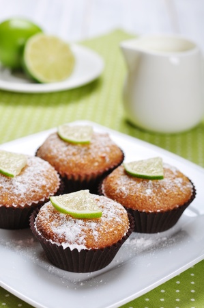 Diet muffins with bran  and fresh lime on plateの写真素材