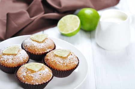 Diet muffins with bran  and fresh lime on plateの写真素材