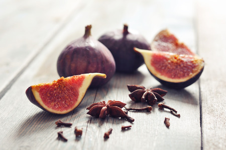 Fresh ripe fruit figs  on wooden backgroundの写真素材