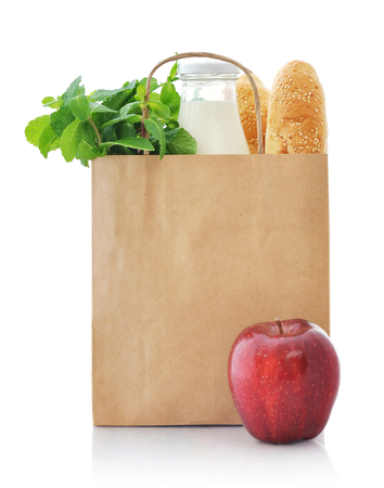 Brown paper bag with food isolated on a white backgroundの写真素材
