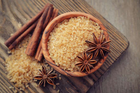 Cinnamon sticks and star anise with brown sugar closeupの写真素材