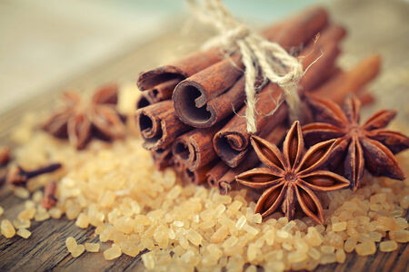 Cinnamon sticks and star anise with brown sugar closeupの写真素材