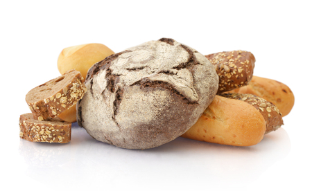 Composition with bread and rolls  isolated on whiteの写真素材