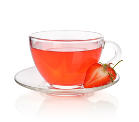 Strawberry tea in glass cup with fresh berries isolated on whiteの写真素材