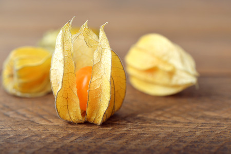 Physalis fruits closeup on wooden backgroundの写真素材