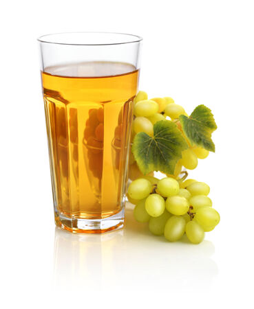Glass of grape juice isolated on white backgroundの写真素材