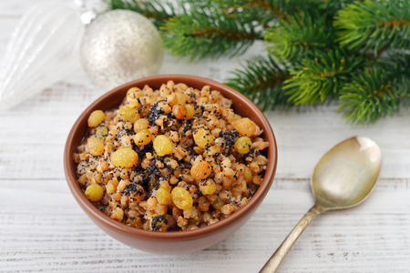 Traditional Christmas slavic dish with boiled wheat, raisins, nuts and honeyの写真素材