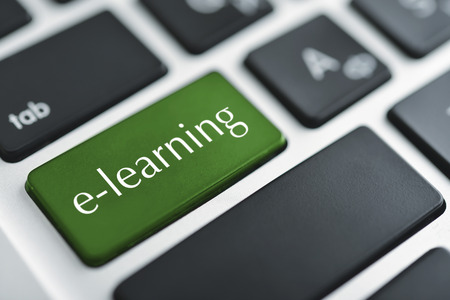 Concepts of E-learning, for computer based learning, with a message on enter key of keyboard.の写真素材