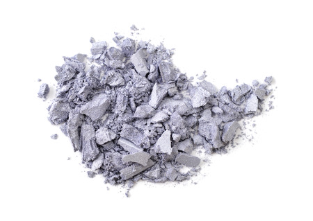 Pile of crushed eyeshadow isolated on white backgroundの写真素材