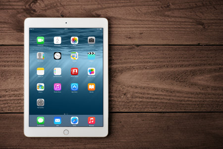 KIEV, UKRAINE - JANUARY 29, 2015: Brand new white Apple iPad Air 2, 6th generation of the iPad, developed by Apple inc. and was released on October 16, 2014のeditorial素材