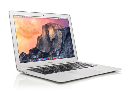 KIEV, UKRAINE - JANUARY 29, 2015: Studio shot of brand new Apple MacBook Air Early 2014 with home page on screen, designed and developed by Apple Inc., it was released on April 29, 2014のeditorial素材