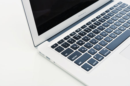 KIEV, UKRAINE - JANUARY 29, 2015: Studio shot part of brand new Apple MacBook Air Early 2014, designed and developed by Apple Inc., it was released on April 29, 2014のeditorial素材